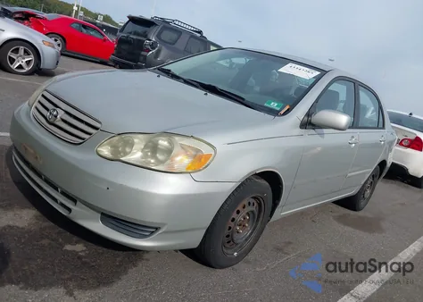 2004 Toyota Corolla Le from USA, damaged, VIN 2T1BR32E94C302309
